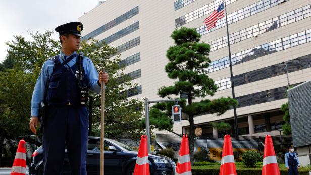 Policemen stand in front of the U.S. embassy ahead of U.S. President Donald Trump's visit to Japan in Tokyo Policemen stand in front of the U.S. embassy ahead of U.S. President Donald Trump's visit to Japan in Tokyo