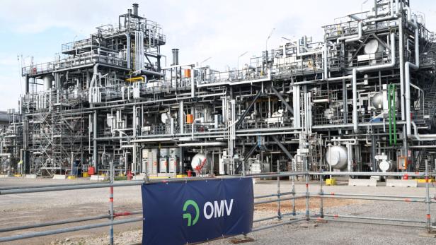 A view of a logo of Austrian oil, gas and chemicals group OMV in front of their ReOil plant in Schwechat, A view of a logo of Austrian oil, gas and chemicals group OMV in front of their ReOil plant in Schwechat,
