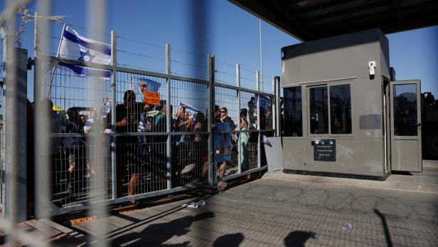 Protesters gather outside Sde Teiman detention facility near Beersheba