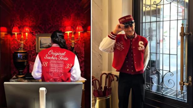 Zwei Hotel-Sacher-Mitarbeiter mit roter Logo-Jacke