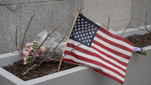 A makeshift memorial a day after two National Guard members were shot, in Washington