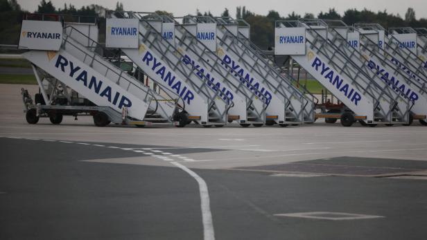 FILE PHOTO: Ryanair branded aircraft steps are seen on the tarmac of Manchester Airport in Manchester, Britain