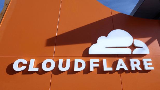 FILE PHOTO: A logo of CLOUDFLARE sits at the WEF in Davos