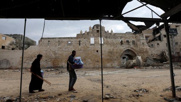 Gaza works on restoring damaged historical sites after two years of war in Gaza City