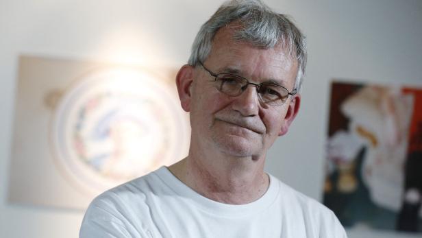 FILE PHOTO: Photographer Parr poses for a photograph during the presentation of the House of Holland Spring/Summer 2015 collection during "London Collections: Men" in London