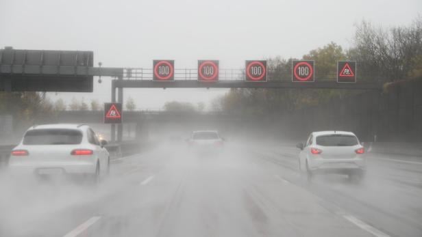 Cars in the rain on the highway