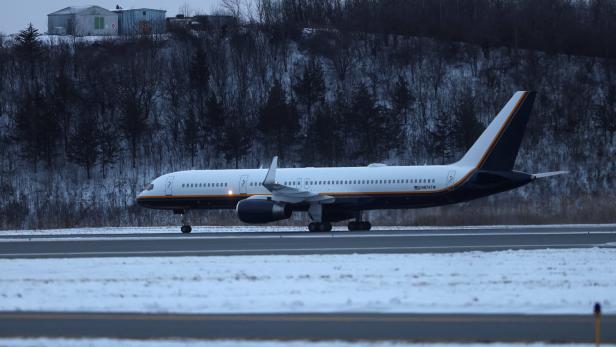 An airplane taxis after landing on the day Venezuela's President Nicolas Maduro and his wife Cilia Flores are expected to arrive before their scheduled court appearance at Manhattan federal court, at Stewart Air National Guard Base in Newburgh