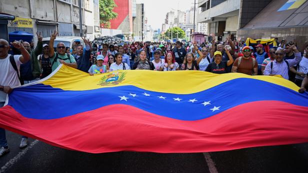 Demonstration outside the National Assembly in Caracas on the day Delcy Rodriguez was formally sworn in as Venezuela's interim president