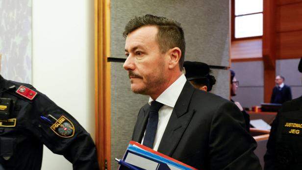 Austrian former property tycoon Rene Benko leaves the courtroom during a break after the start of his second insolvency fraud trial in Innsbruck