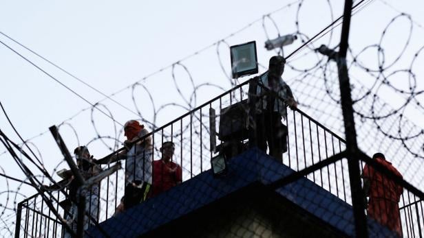 Guatemala inmates riot at three prisons, take hostages, officials say