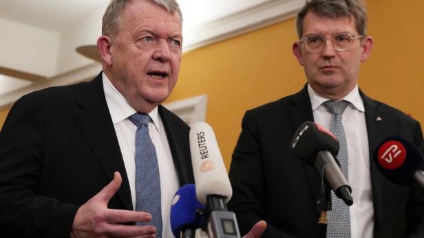 Danish Foreign Minister Lars Lokke Rasmussen and Defence Minister Troels Lund Poulsen talk to media in Copenhagen