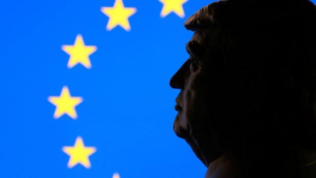 FILE PHOTO: Illustration shows 3D-printed miniature model of U.S. President Donald Trump, EU flag