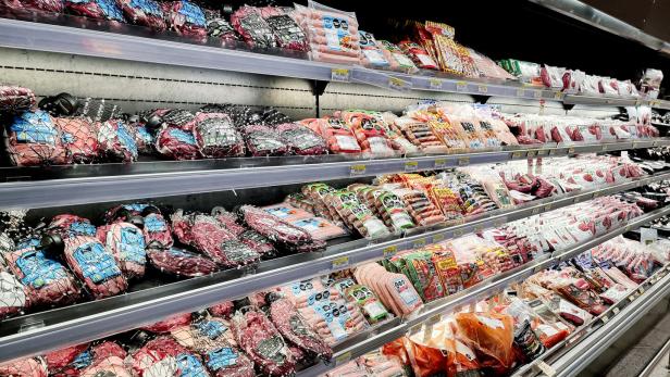 Meat products are displayed for sale in a supermarket in Bogota