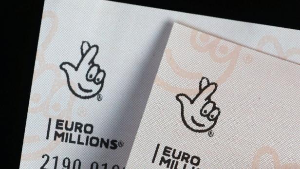 Photo illustration of EuroMillions lottery ticket