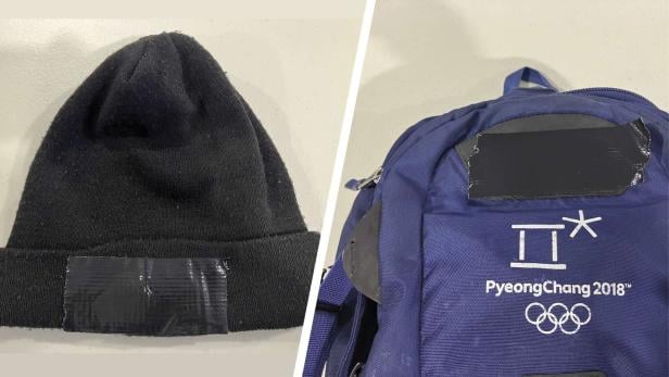 Logos auf Mützen und Rücksäcke werden abgeklebt.