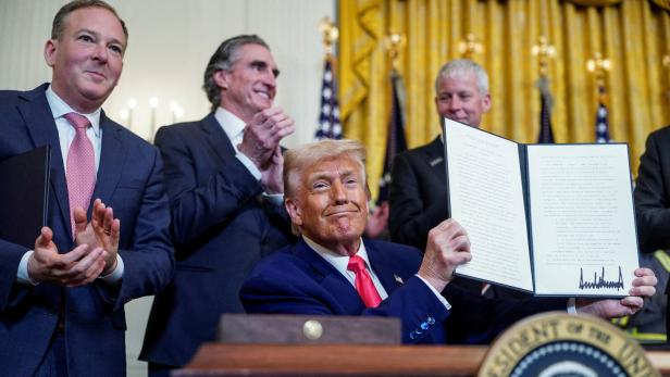 U.S. President Donald Trump signs executive orders in Washington