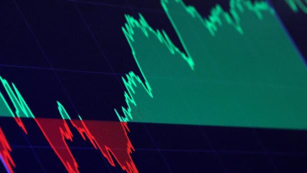 FILE PHOTO: A screen shows trading numbers after the closing bell on the floor at the NYSE in New York