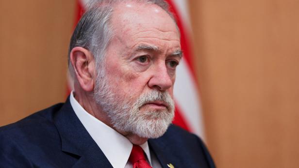 FILE PHOTO: U.S. Ambassador to Israel Mike Huckabee attends an interview with Reuters at his office in the U.S. Embassy in Jerusalem