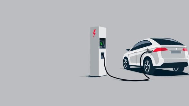 White Electric Car Suv Charging at the Charger Station