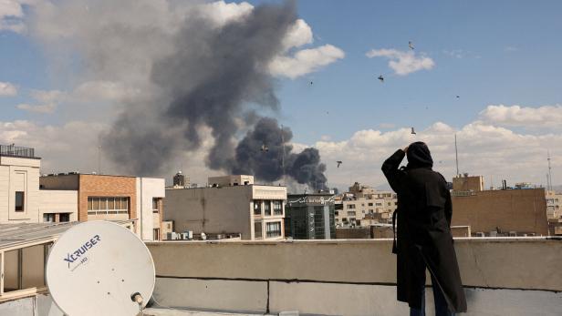 Smoke rises following an explosion, after Israel and the U.S. launched strikes on Iran, in Tehran