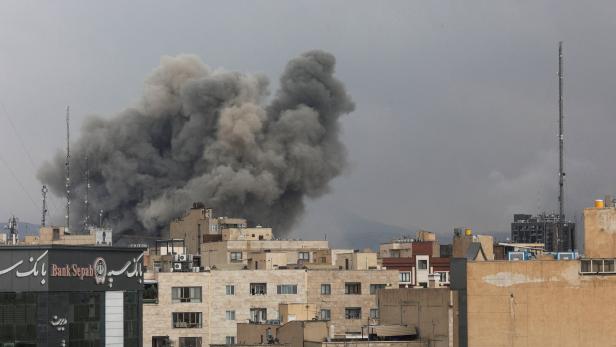Smoke rises following an explosion, after Israel and the U.S. launched strikes on Iran, in Tehran