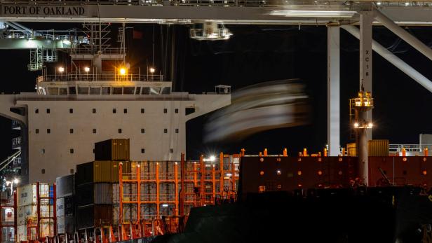 Shipping containers at the port of Oakland , California