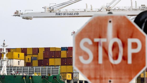 Shipping containers at the port of Oakland , California