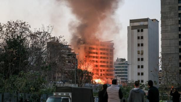 Smoke billows after an Israeli strike on Beirut's southern suburbs
