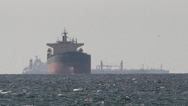 FILE PHOTO: Tankers sail in the Gulf, near the Strait of Hormuz