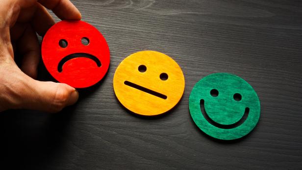 Negative feedback and rate with bad smile face.