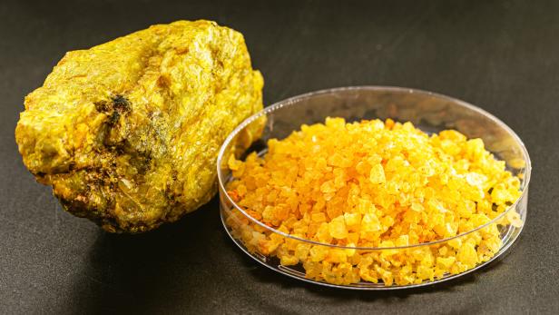 uranium nitrate called uranyl, with uranium ore, radioactive material on isolated white background