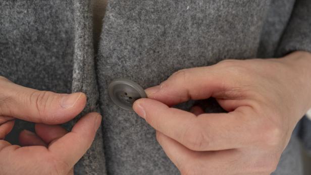 coat button up close up