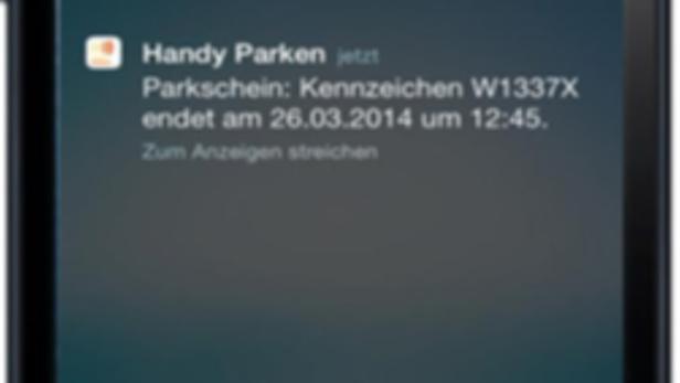 Auf dem Bildschirm eines iPhones wird eine Benachrichtigung von „Handy Parken“ angezeigt.