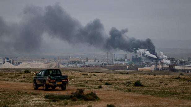 Smoke rises following an Iranian missile strike, in Southern Israel