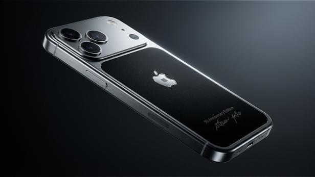 iPhone mit schwarzer Rückseite, Apple-Logo, „50 Anniversary Edition“ und Signatur von Steve Jobs.