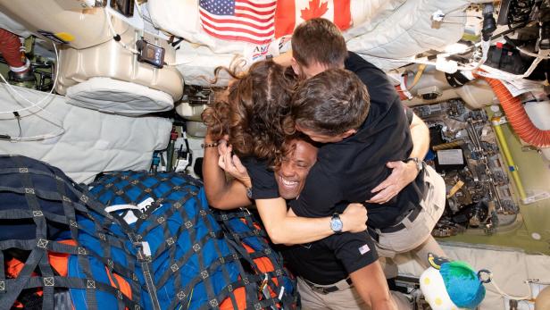 The NASA Artemis II crew embrace