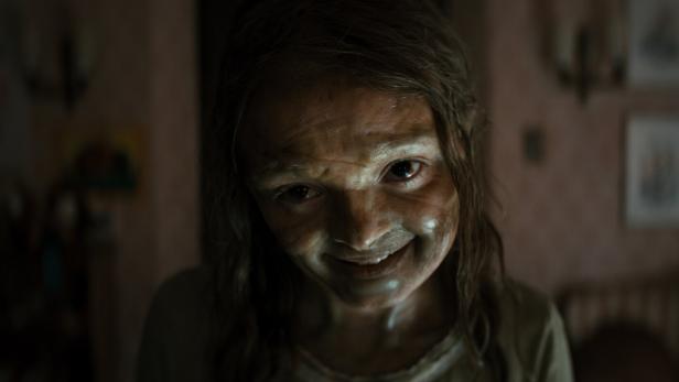 Grinsendes Horrorkind.