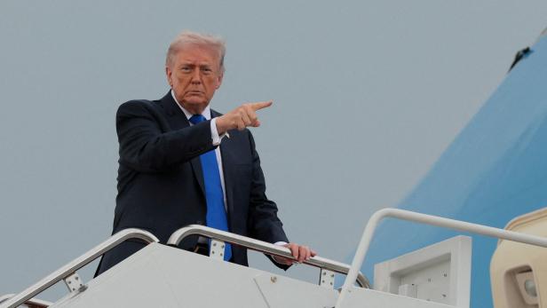 FILE PHOTO: U.S. President Donald Trump boards Air Force One en route to Palm Beach International Airport, at Joint Base Andrews