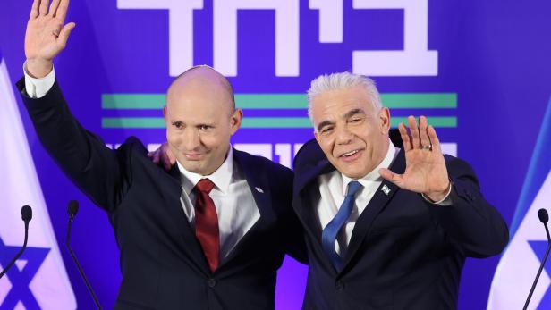 Israel's former prime ministers Naftali Bennett, Yair Lapid merge parties ahead of elections