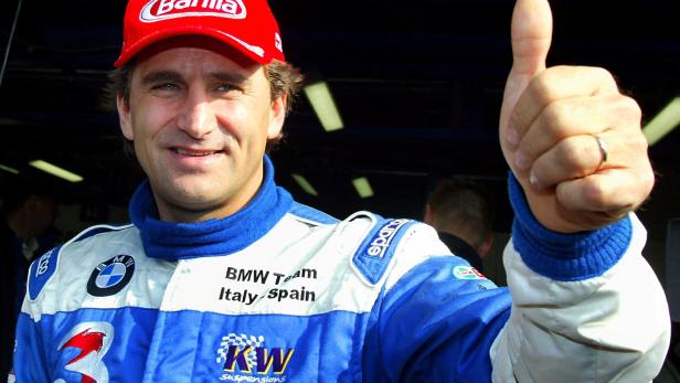 FILE PHOTO: ITALIAN DRIVER ZANARDI GIVES THUMBS UP BEFORE LG SUPER RACING CAR EVENTIN MONZA.