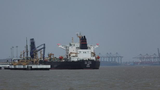 India-flagged tanker Desh Garima unloads crude oil at an offloading terminal after transiting the Strait of Hormuz, amid supply disruptions linked to the U.S.-Israeli conflict with Iran, in Mumbai