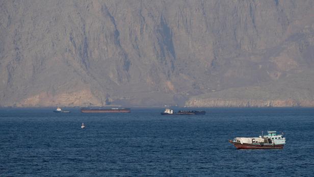 FILE PHOTO: Tankers and other vessels in the Strait of Hormuz off the coast of Musandam