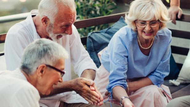 Senior Friends Playing Backgammon