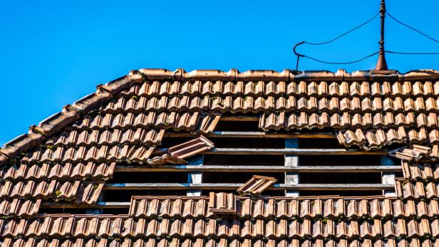 damaged roof at an old house
