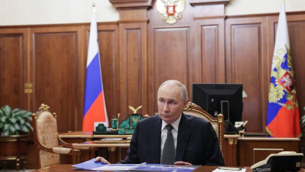 Russian President Vladimir Putin chairs a meeting in Moscow