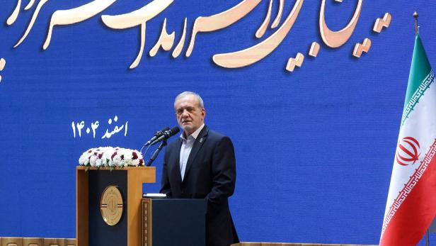 Iranian President Masoud Pezeshkian speaks during a meeting in Tehran