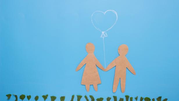 Silhouettes of man and woman