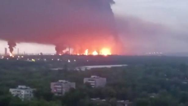 FILE PHOTO: Fire and a thick plume of smoke rise in the vicinity of the Ryazan oil refinery, amid the Russia-Ukraine conflict in Ryazan