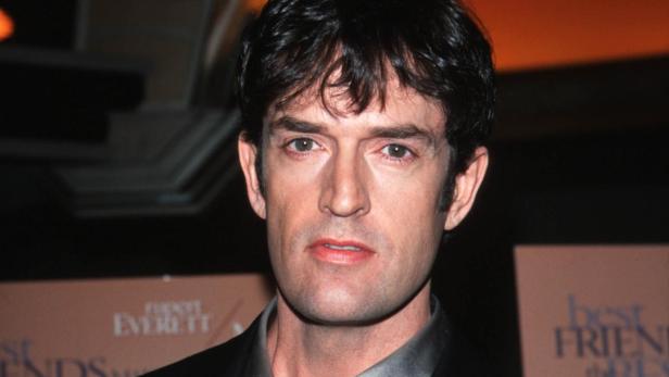 Rupert Everett in den 90er Jahren bei einer Veranstaltung