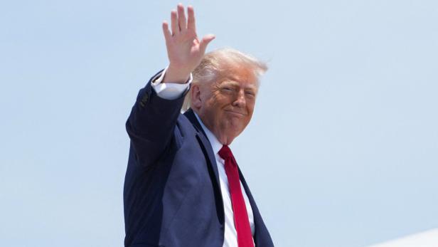 U.S. President Trump boards Air Force One en route to Eau Claire, Wisconsin, at Joint Base Andrews